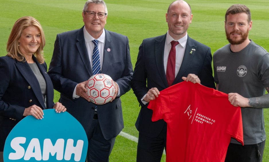 Liz Bowie (Chief Executive Officer Aberdeen Football Club Community Trust), Billy Watson (Chief Executive SAMH (Scottish Action for Mental Health)), Neil Gray (Health Secretary) and Kyle Hewitt.