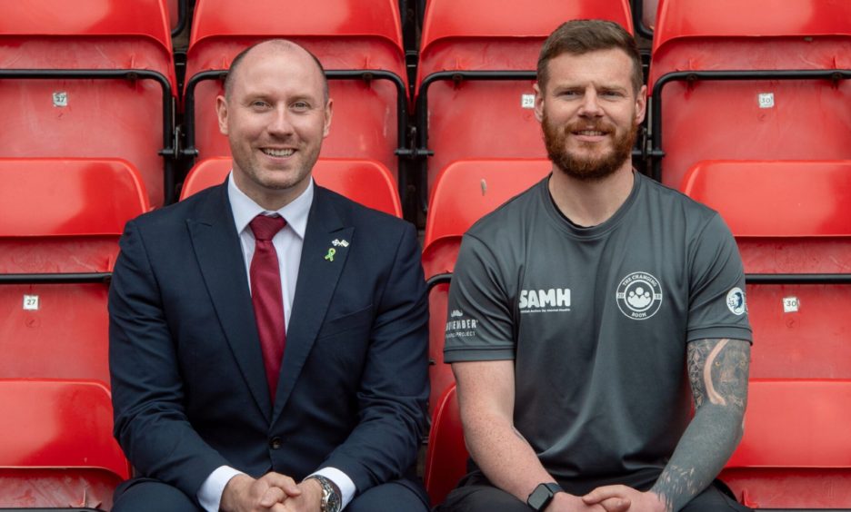 Health Secretary Neil Gray visited Aberdeen to announce support for the Dons' mental health initiative and met with one of its participants Kyle Hewitt.