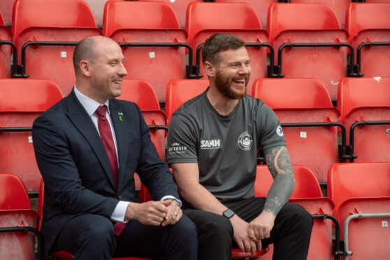 Health Secretary Neil Gray, left, visited Aberdeen to announce support for the project and met with one of its participants Kyle Hewitt, right. Image: Kenny Elrick/DC Thomson.