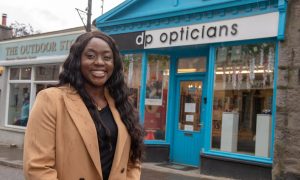 Christy outside DP Opticians in Ballater