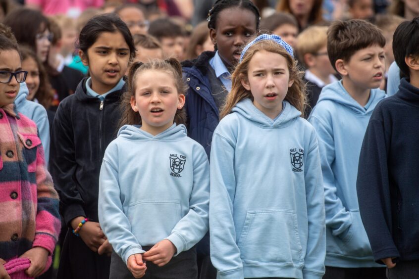 Girls from Mile End Primary perform their songs.