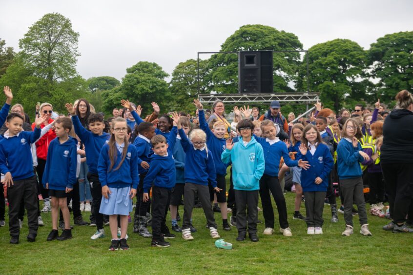 Primary 4 pupils from across the city came together in Duthie Park to sing as one large choir.