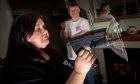 Julie and Ian with their paranormal investigation equipment