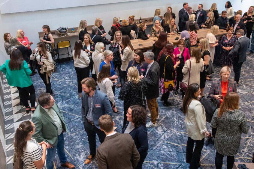 Guests mingling at CHeRries Awards reception.