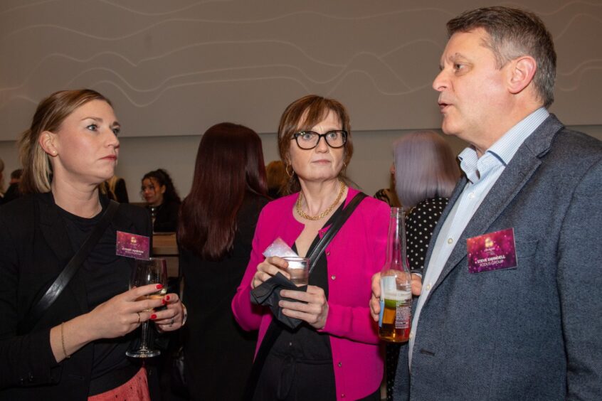 Guests enjoy drinks at CHeRries Awards reception.