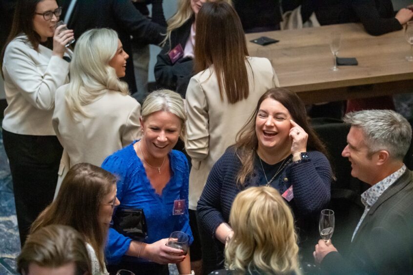 Guests have a laugh at event at Hilton Teca.