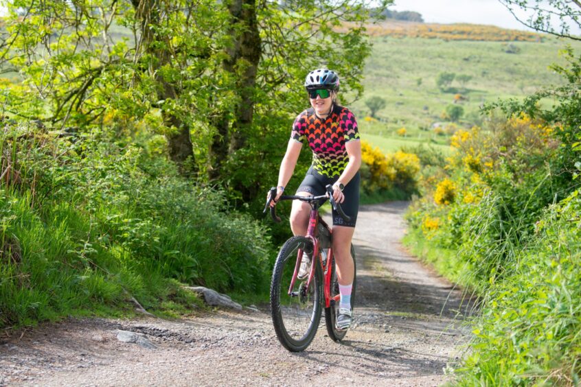 Eilidh Prise training for a Triathlon on her bike