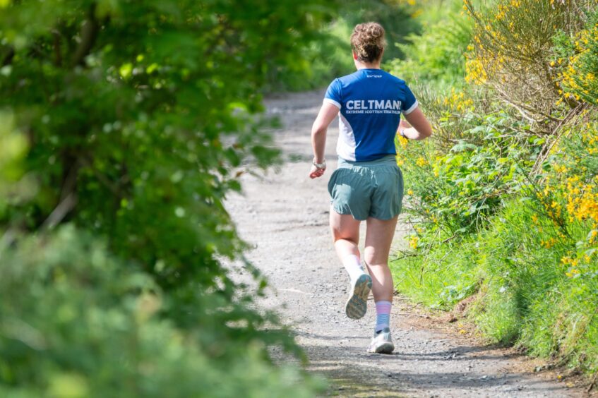 Eilidh Prise training for a Triathlon