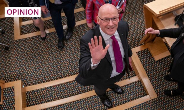 John Swinney in Holyrood's main chamber after officially becoming the SNP's leader earlier this week. Image: Jane Barlow/PA Wire