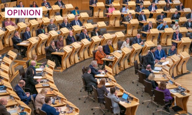 First Minister Humza Yousaf announcing the "termination" of the Bute House Agreement. Image: PA.