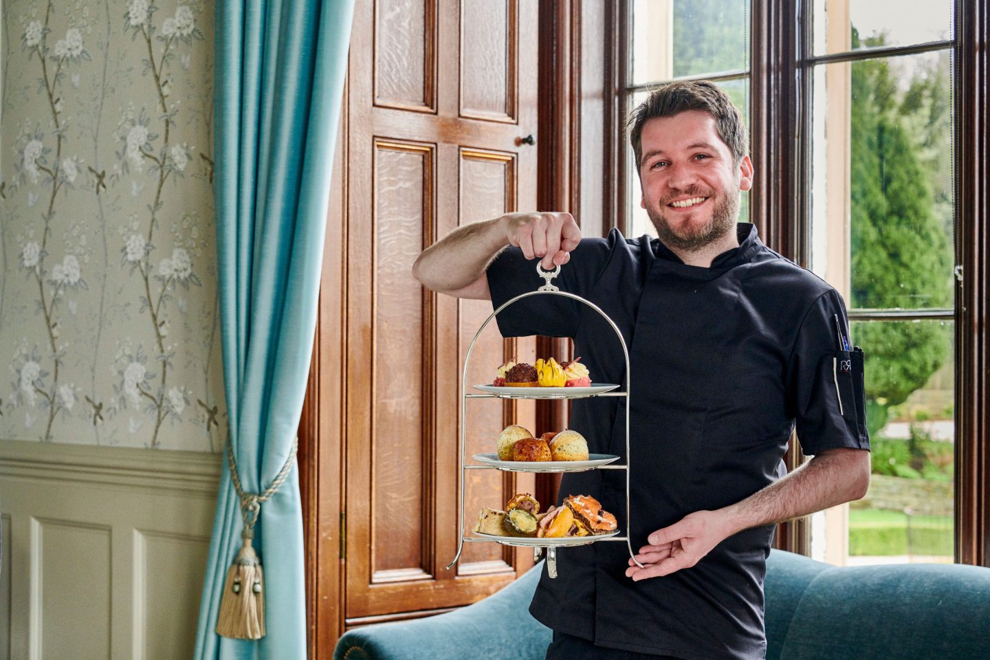 Maften Hall pastry chef presents the afternoon tea.