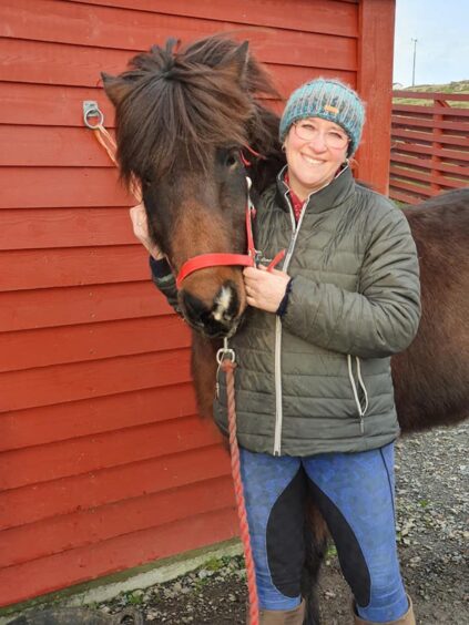 Dorothy with one of her Icelandic horses, Hordur. 