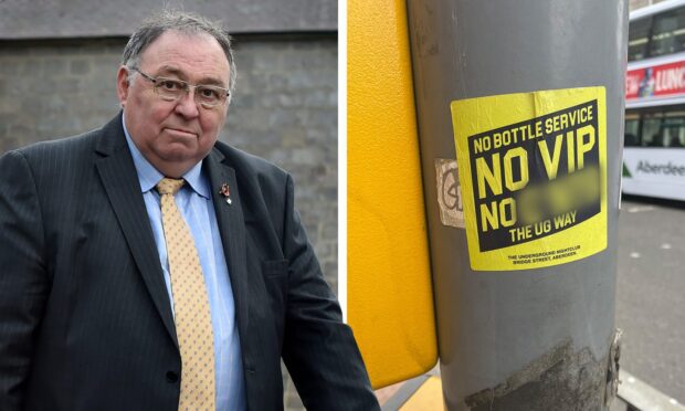 Councillor Neil Copland and a sticker promoting Underground nightclub. Image: DCT Media