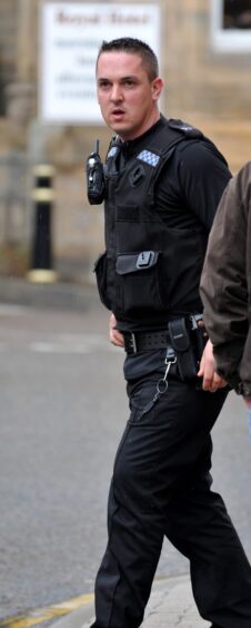 Christopher Wylie in his police uniform in May 2013 when he gave evidence as a witness at Tain Sheriff Court.