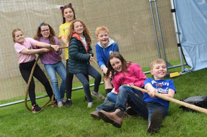 kids playing tug of war at the Gathering