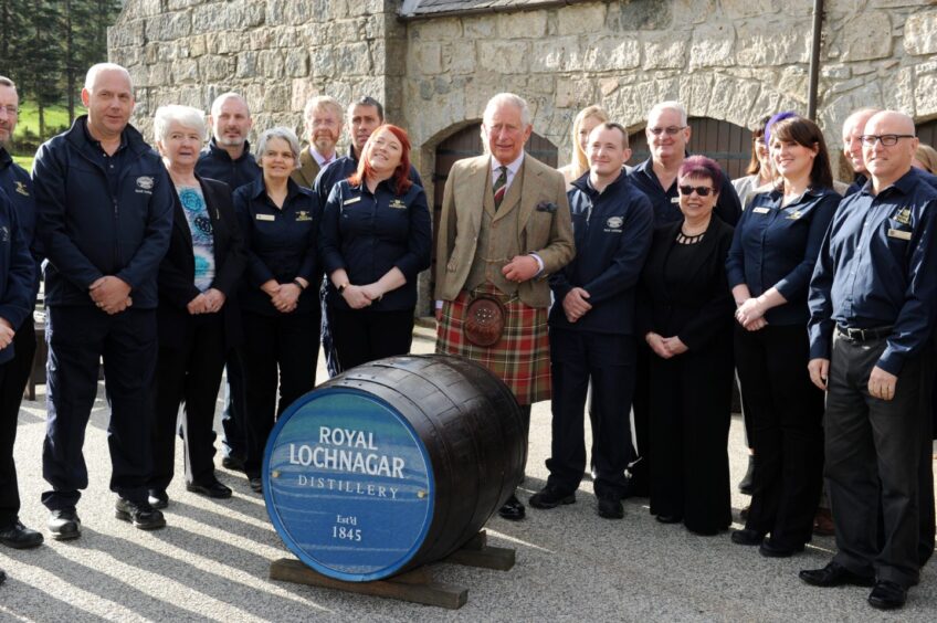 Duke of Rothesay, Prince Charles visited Royal Lochnagar Distillery, Crathie, Ballater. HRH meet operators at the distillery before touring the warehouse.
