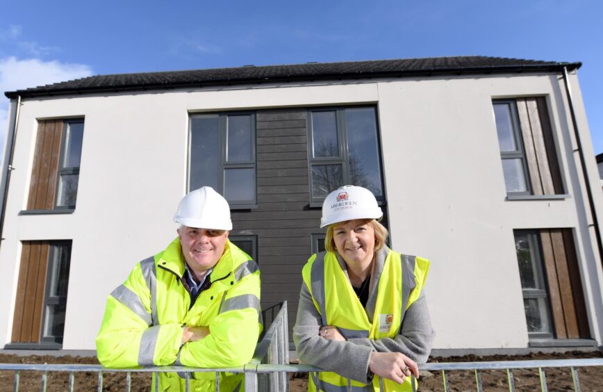 Aberdeen City Council Architect Colin Doig outside new homes at Middlefield with council leader Jenny Laing in 2017