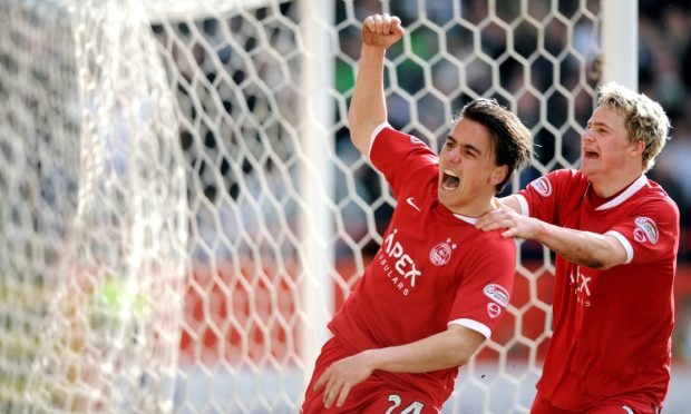 Jeffrey De Visscher celebrates with Chris Maguire after scoring to put Aberdeen 1-0 up in their March 2008 Scottish Cup quarter-final with Celtic at Pittodrie. Image: Kami Thomson/DC Thomson.