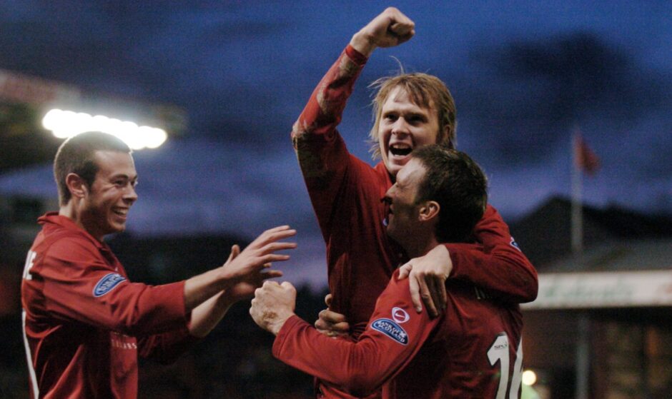 Darren Mackie celebrates scoring against St Mirren in 2006.