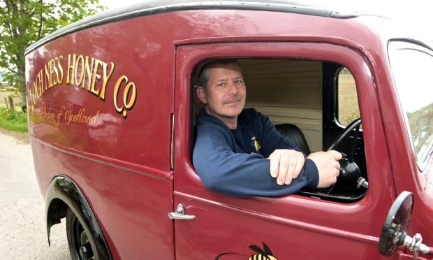 Andrew Card with his Austin delivery van which was originally sold as new in Inverness in 1937. Image: Sandy McCook/DC Thomson