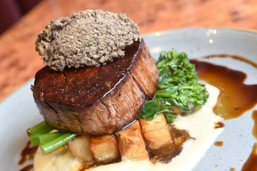 Angus fillet steak, crisp potatoes, mushroom duxelles, shallot puree, sprouting broccoli and port jus at Cafe 1