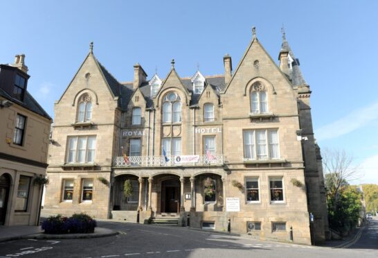 Aurimas Samalkis hid his face as he left Aberdeen Sheriff Court. Image: DC Thomson