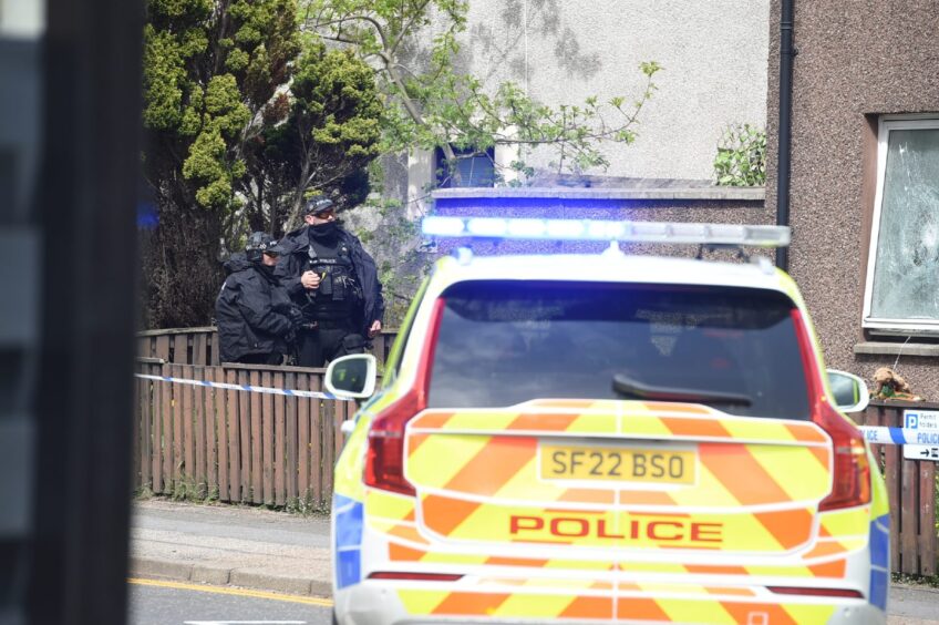 Police working in Kenneth Street. 