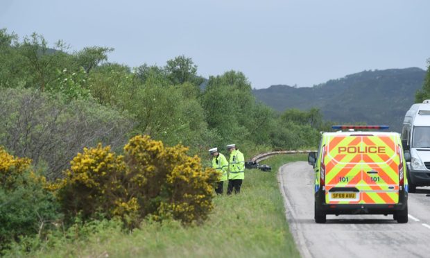 Police at scene of A837 crash