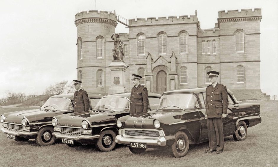Police patrol cars at Inverness castle in 1957