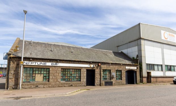 'The Niptune Ba': Not even the signs above the door could help out the baffled people sitting their Aberdeen taxi street knowledge test. Image: Scott Baxter/ DC Thomson