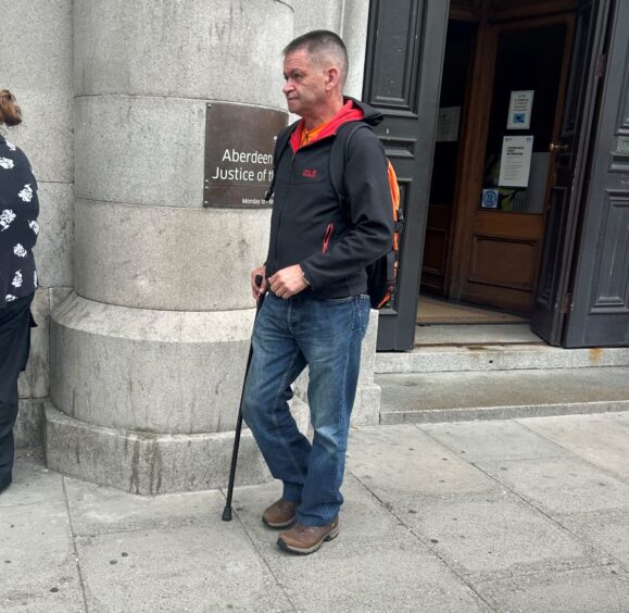 Allan Strachan leaving Aberdeen Sheriff Court.