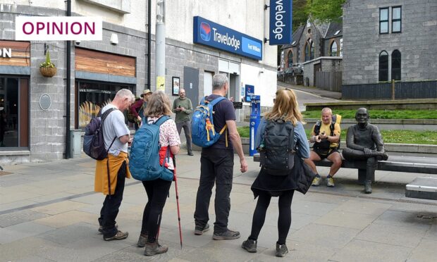 To go with story by Jacqueline Wake. West Highland Way Picture shows; West Highland Way. Fort Walkers congregate in front of Wetherspoon's in Fort William after completing the West Highland Way. Image:
Sandy McCook/DC Thomson.
