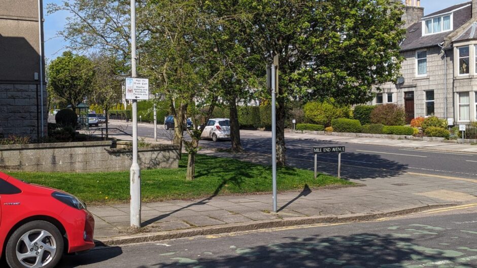 Signs showing permit and voucher only parking in Mile End Avenue. Image: Alastair Gossip/DC Thomson