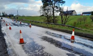 Cones on the roadside of the A96 amidst roadworks