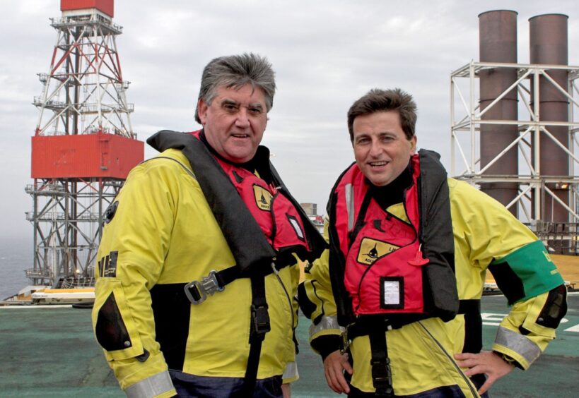 Dave Blackwood, left, during his time at BP. Pictured with him on a visit to the energy firm's Bruce platform is the then Scottish Secretary Douglas Alexander.