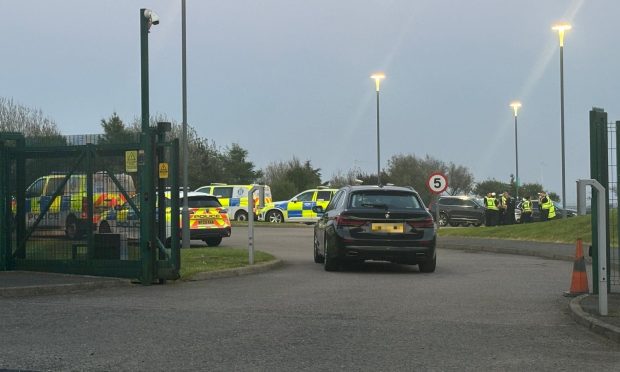 Police cars at the scene of an incident in Balmedie.