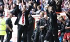 Aberdeen manager Jimmy Calderwood celebrates as his side secure fourth place and European football for next season. Image: SNS.