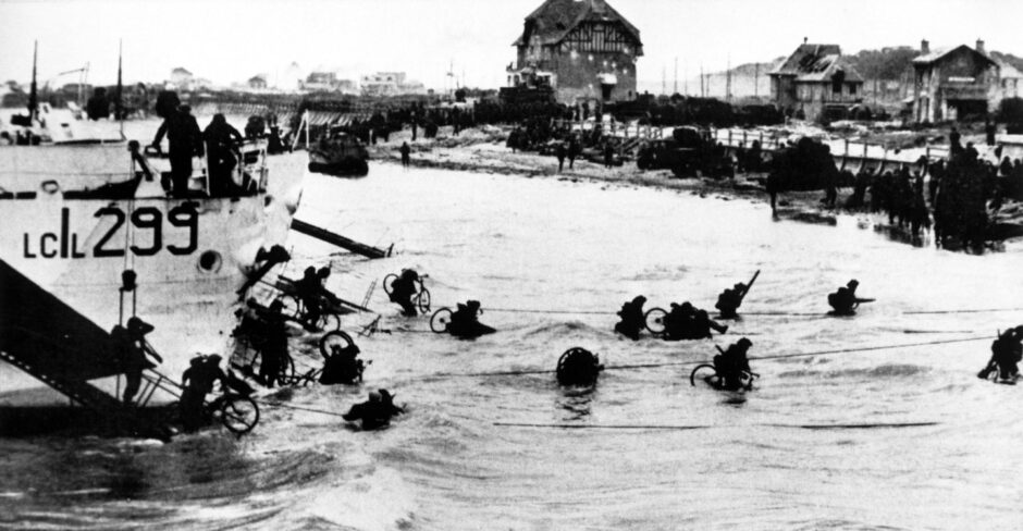 Troops wading ashore for the invasion of Normandy, D-Day 1944.