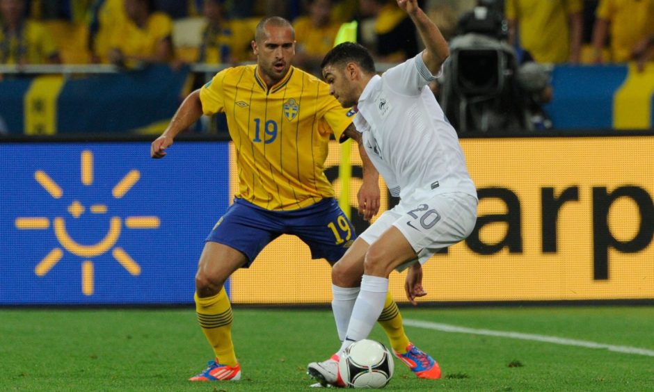 France's Hatem Ben Arfa battles Sweden's Emir Bajrami during the side's Euro 2012 Group D match in Kiev, Ukraine. Image: Shutterstock.