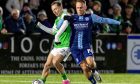 Harry McKirdy of Hibernian and Seb Ross of Forfar  compete for possession of the ball. Image: Shutterstock.