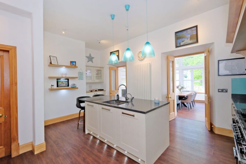 Stylish kitchen with island at Derranbank