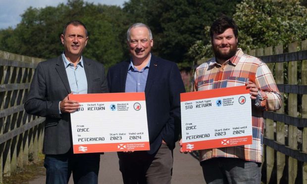 Aberdeen and Grampian Chamber of Commerce chief executive Russell Borthwick with CNER campaigners Craig Leuchars and Jordan Jack at at the Parkhill Viaduct, near Dyce.