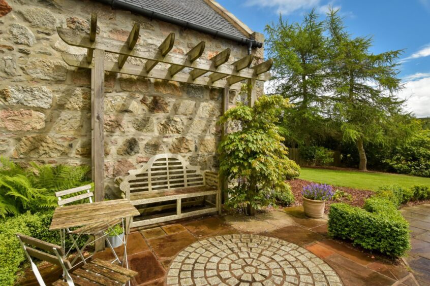 Patio area at Struan House at Mill Of Crynoch,