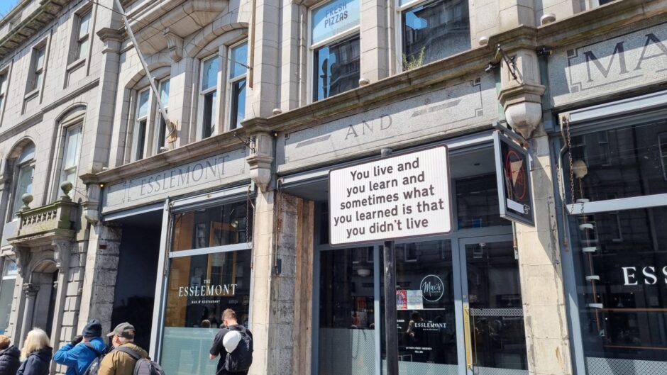 Sign in Aberdeen reads: "You live and you learn and sometimes what you learned is that you didn't live"