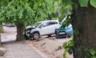 One car collided with a tree. Image: Graham Fleming/DC Thomson.