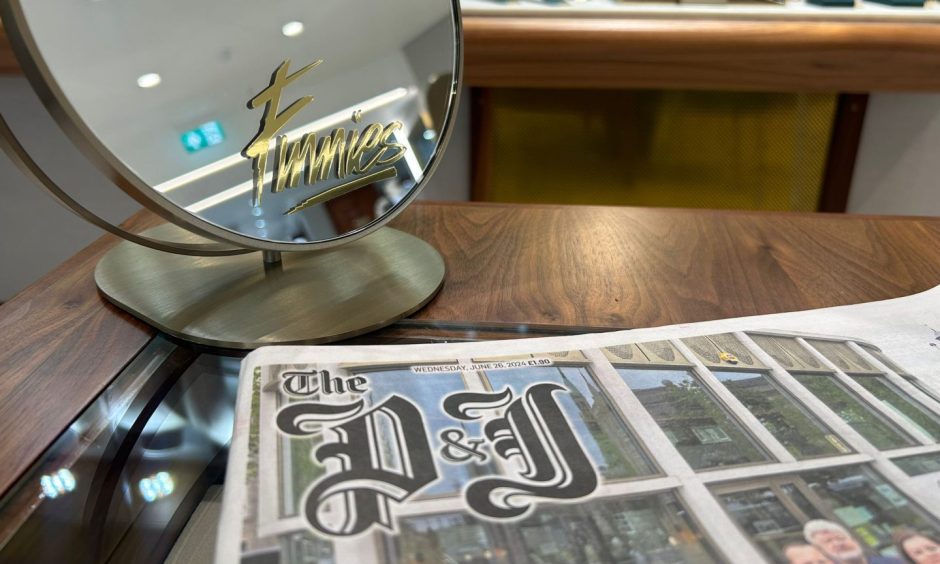A Press and Journal newspaper at Aberdeen store FInnie's Jewellers.