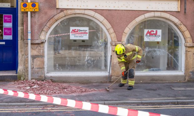 Poundland in Elgin has been surrounded by a web of scaffolding for most of the last six years. Image: Jason Hedges/DC Thomson