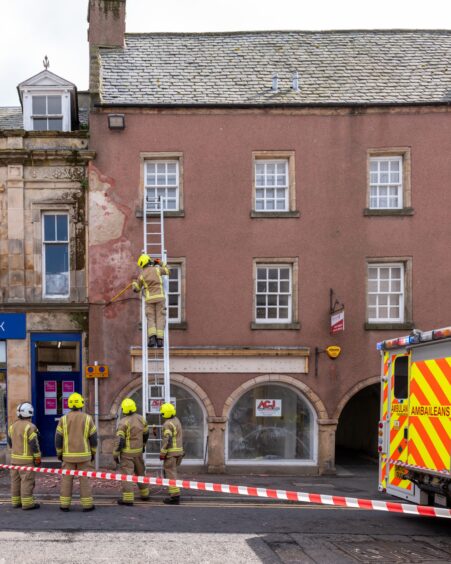 Man struck by falling masonry in Elgin