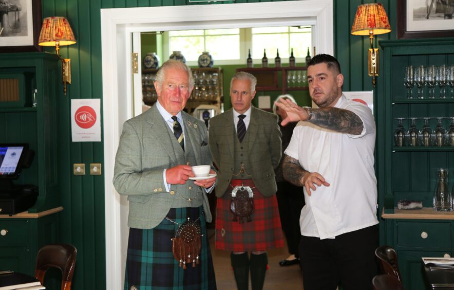 The then Prince Charles in 2021 with Robert Lovie and executive chef Ross Cochrane at Rothesay Rooms in Ballater, Aberdeenshire.