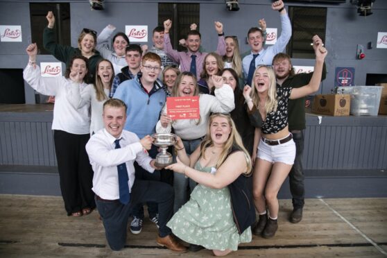 Members celebrate the national win at this year's Royal Highland Show.